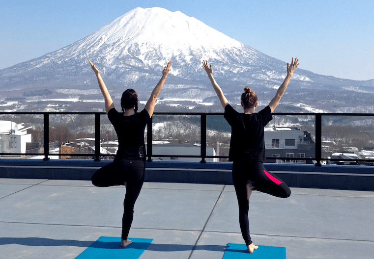 Yoga while watching Mount Yotei is the perfect way to end a day after skiing or snowboarding.