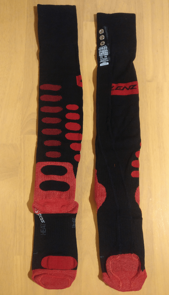 Heated sock with battery attachment