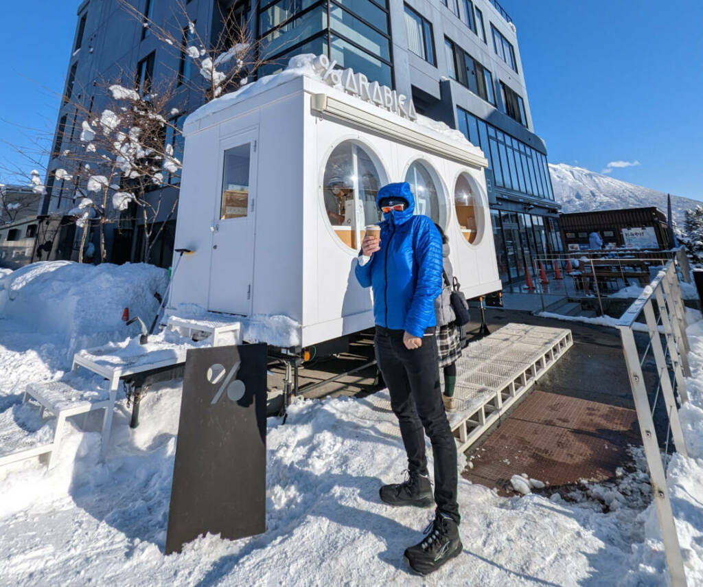 Having a coffee outside % Arabica coffee truck in Niseko