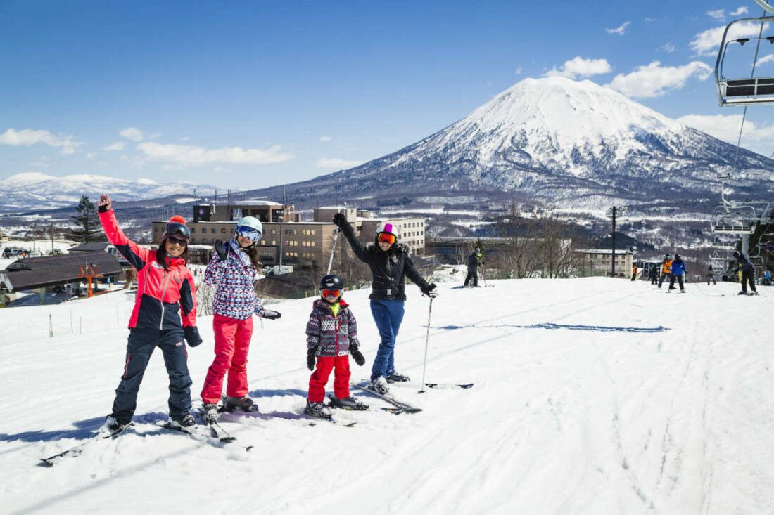 Family enjoying spring skiing in Niseko with Hokkaido Ski Club