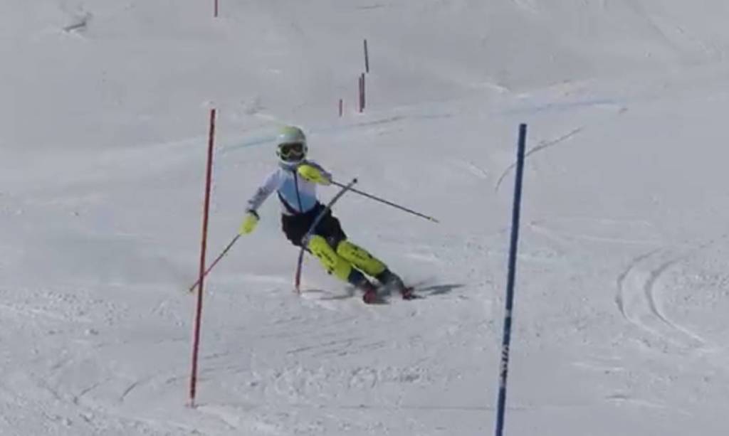 Samantha ski racing down a slalom course