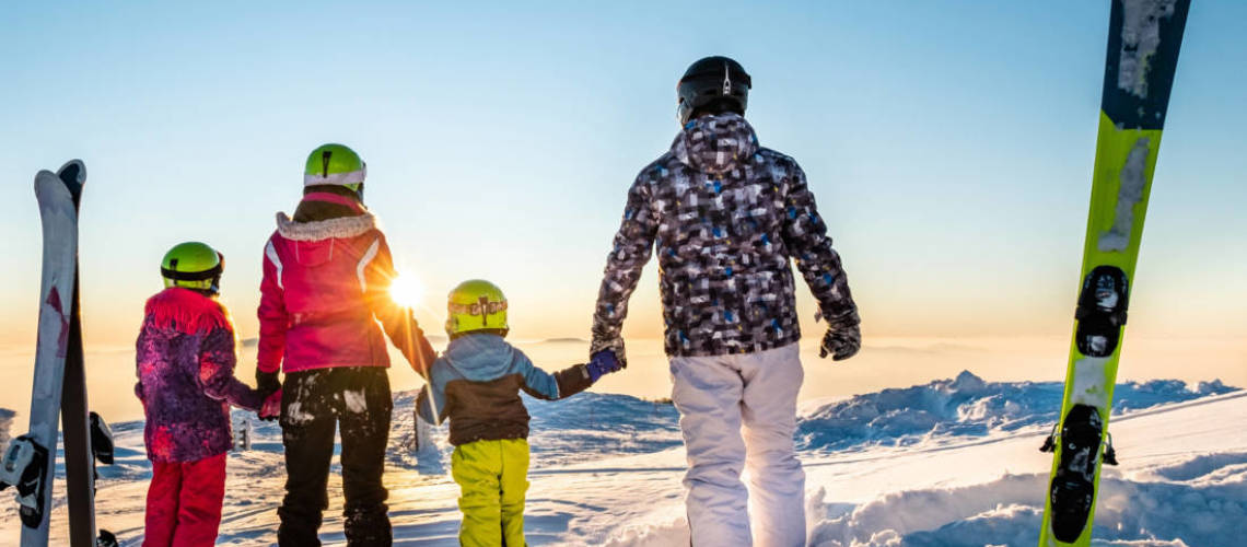 Family ski pose